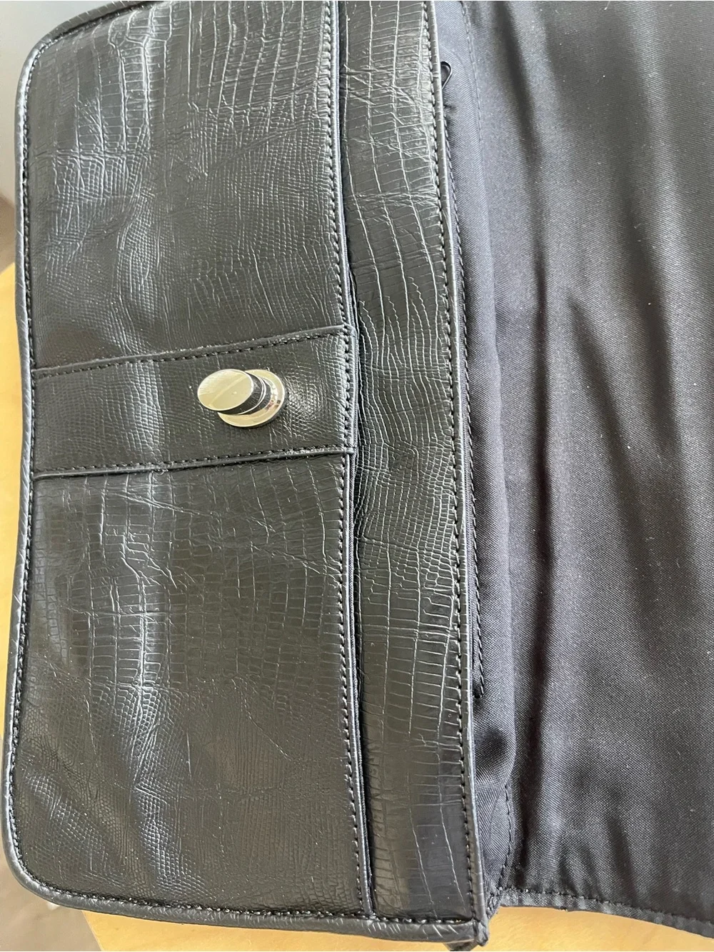 Cosmopolitan Black Leather Wristlet with Turn-Lock Accent